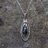 (AP64) Silver And Green Amber Oval Pendant