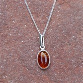 (AP79) Silver And Orange Amber Oval Pendant