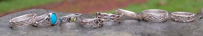 silver celtic rings narrow.jpg